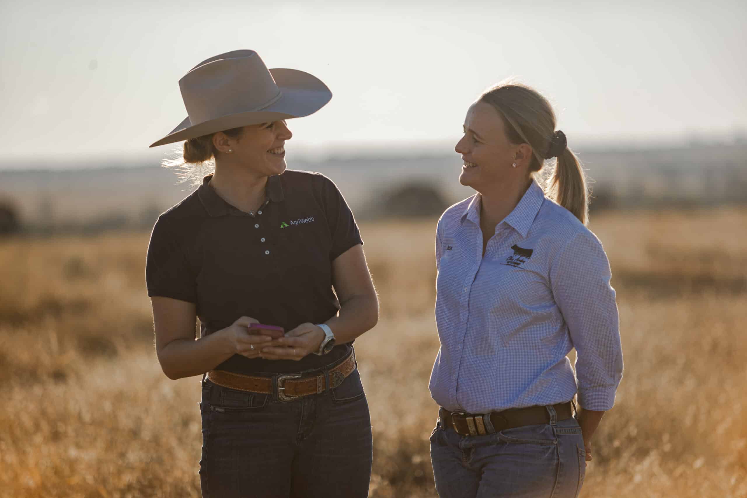 AgriWebb Program Hub - Izzy and Customer in Paddock